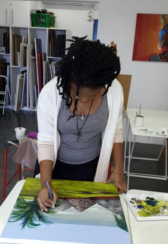 A student developing her portfolio at Tiga Studios